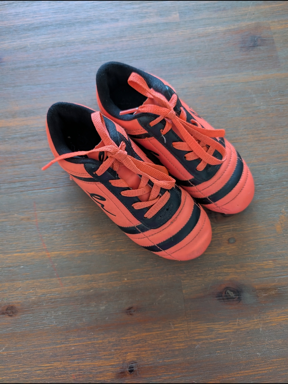 Kids Orange And Black Soccer Sneakers